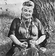 Ojibway herb doctor Keewaydinoquay Pakawakuk Peschel in native dress.